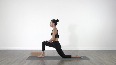 Yogi is practising yoga on a blue yoga mat on white background