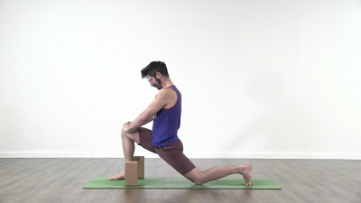 Yogi is practising yoga on a blue yoga mat on white background