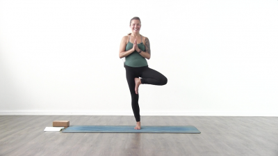 Yogi is practising yoga on a blue yoga mat on white background